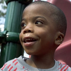 Boy smiling at park 