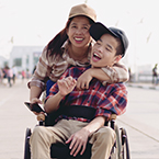 Adult man with disability and his mother