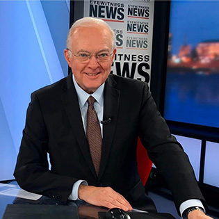 a photo of Brad Byrd at the Eyewitness News anchor desk