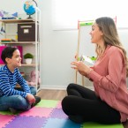 Child working with a speech therapist