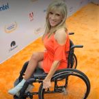 Easterseals Board Member and sports reporter Maria Serrao on the orange carpet at EDFC.