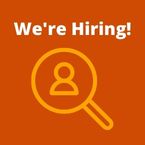 We're Hiring! Graphic of magnifying glass with a person inside of it